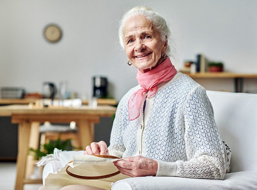 elderly woman happy in a nursing home
