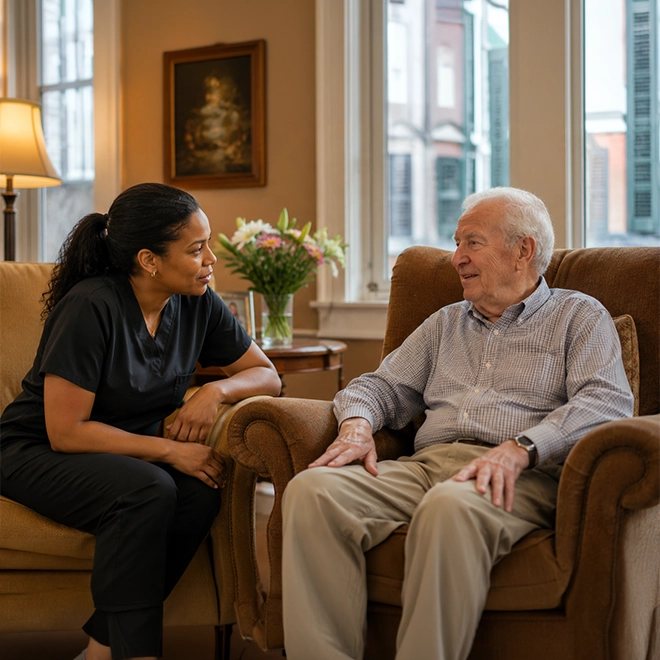 A caregiver with a senior resident at St. Margaret's in New Orleans.