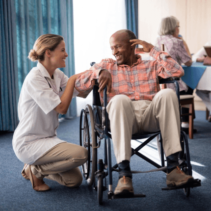 nurse and man in nursing home
